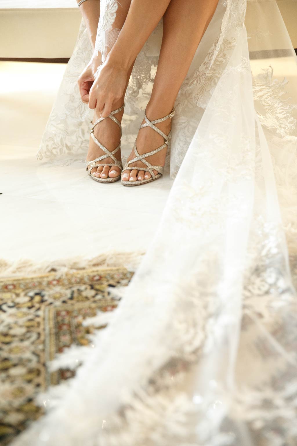 Bridal shoes and wedding dress tail